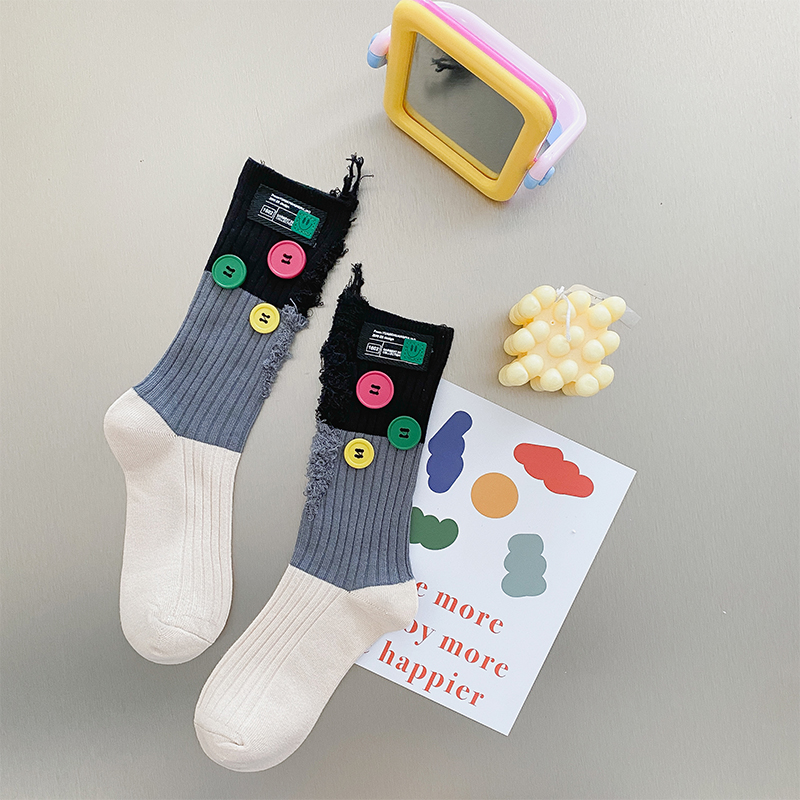 Button mendicus colorblock tibialia