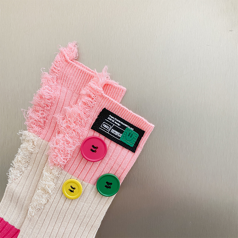 Button mendicus colorblock tibialia